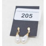 A pair of 9ct gold and pearl earrings Report by RB Modern