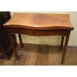 An inlaid mahogany serpentine front card table, on chamfered square legs, 86 cm wide