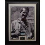 A photograph of Edmund Hillary, inset his signature on a piece of paper, and a plaque, 48 cm wide,