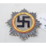 A German cross in gold, dated 1941 in the wreath, no other marks and maker unknown, 6.5 cm diameter