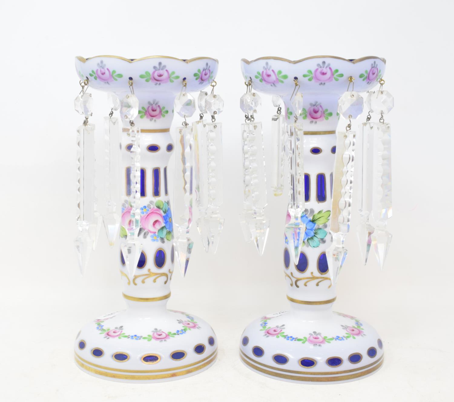 A pair of cased glass lustres, with floral decoration, 26 cm high (2)