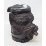 A carved wood tobacco jar, in the form of a dog's head, 18 cm high Modern