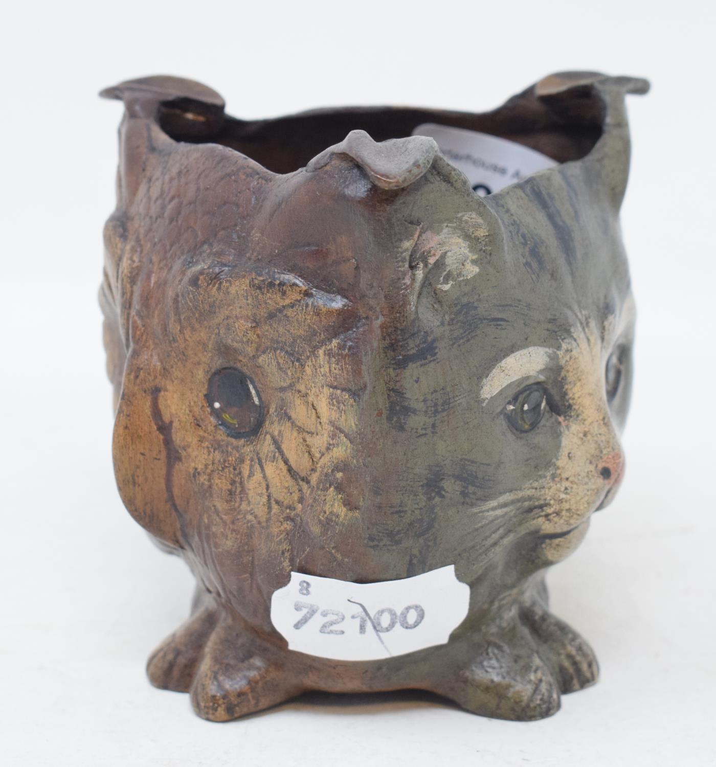 A three sided painted metal cat/dog/owl head ashtray, 9.5 cm high Modern reproduction piece. Good