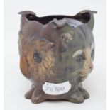 A three sided painted metal cat/dog/owl head ashtray, 9.5 cm high Modern reproduction piece. Good