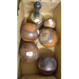 A handbell, with a turned wood handle, 26 cm high, four lignum vitae lawn bowls, and a jack (6)