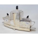 An Art Deco style silver plated four piece tea set, 39 cm wide Modern