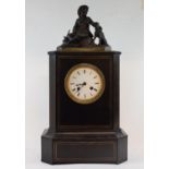 A late 19th/early 20th century mantel clock, the 9.5 cm diameter enamel dial with Roman numerals,