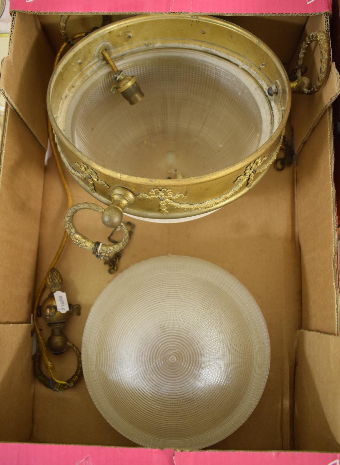 An early 20th century light fitting, decorated ribbon ties and floral swags, with two moulded