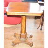 A walnut table, on a platform base, 53.5 cm wide