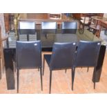 A Calligaris black glass topped extending dining table, 160 cm wide, and six matching chairs (7)