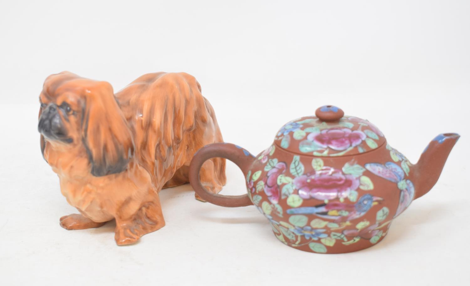 A Royal Doulton King Charles spaniel, HN1012, 8 cm high, a Chinese Yi Xing teapot, other ceramics