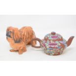 A Royal Doulton King Charles spaniel, HN1012, 8 cm high, a Chinese Yi Xing teapot, other ceramics