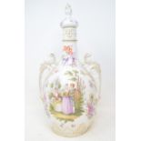 A Limoges two handled vase and cover, decorated a courting scene and flowers, 43 cm high, and