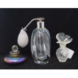 A Lalique frosted and clear glass scent bottle, the stopper in the form of a dove, 10 cm high, and