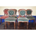 A set of six Victorian mahogany dining chairs, on turned and fluted front legs