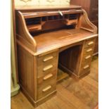 A Lebus oak roll top desk, 121 cm wide