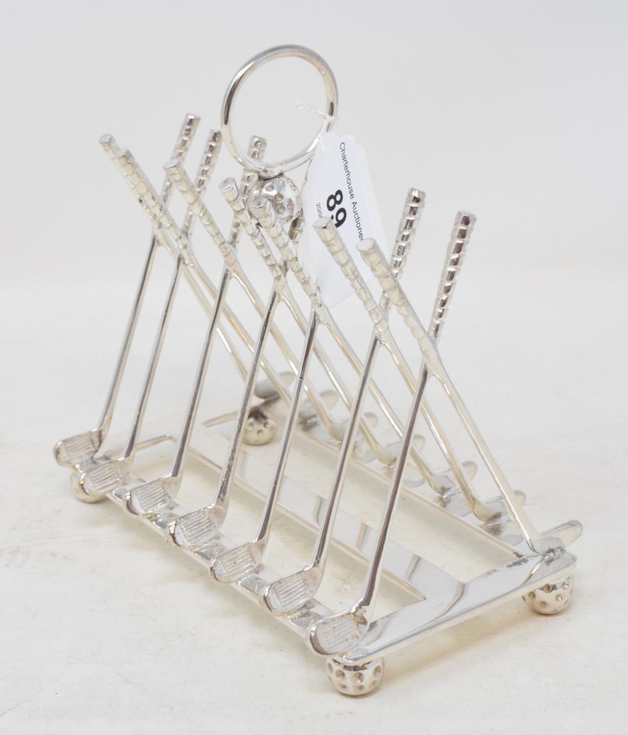 A novelty silver plated golfing toast rack, 16 cm wide Modern