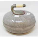 A granite curling stone, initialled P B, 24 cm diameter