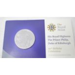 A Royal Mint Prince Philip 90th Birthday £5 commemorative coin, in a presentation wallet