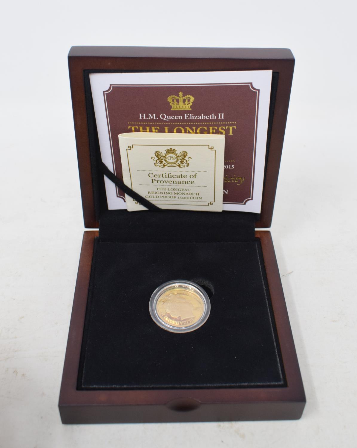 A Longest Reigning Monarch gold £1 proof coin, boxed with certificate
