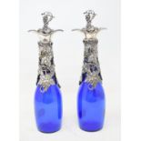 A pair of blue glass decanters, with plated mounts, 16.5 cm high (2) Modern
