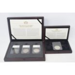 An Edward VII crown, 1902, and three Victorian crowns, 1845, 1899 and 1897, in two boxes, with