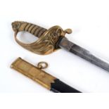 A Victorian naval officer's sword, with a wire bound fishskin grip and a lion head pommel, in a