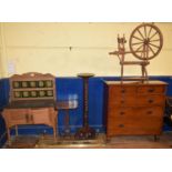 A mahogany chest, of two short and three long drawers, on turned legs, 105 cm wide, a jardiniere