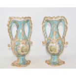 A pair of two handled porcelain vases, each decorated a landscape, 25 cm high (2) Modern