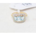 A 9ct gold, square cut blue topaz and diamond ring Report by RB Modern