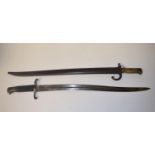 A French bayonet, with a brass handle, and a matching scabbard, and another bayonet (2)