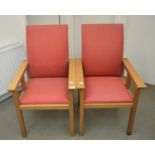 A pair of Cotswold School style oak armchairs, with curved backs on square legs (2)
