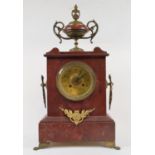 A late 19th century mantel clock, the 8.5 cm brass dial with Arabic numerals, fitted an eight day