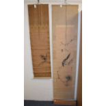 A Japanese scroll, decorated a crow, watercolour, 33 x 133 cm, and another, boxed (2)