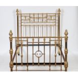 A Victorian brass bedstead, 140 cm wide See illustration Report GH Some of the finials are a bit