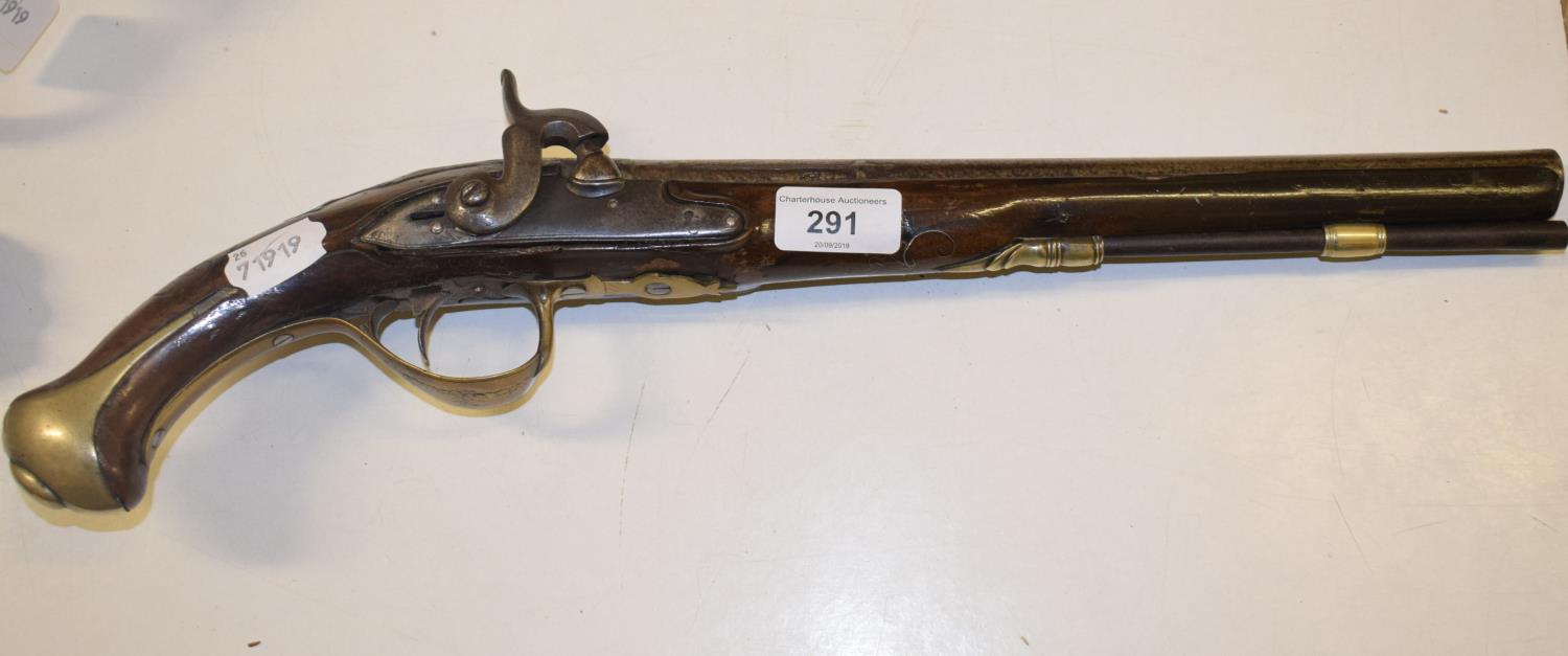 An early 19th century percussion cap pistol, the walnut stock with wire inlaid decoration, some