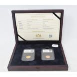 An Elizabeth II proof sovereign, 2014, and a George V sovereign, 1914, boxed with certificate Report