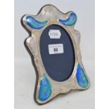 A silver and enamel photograph frame, 15 cm wide Modern