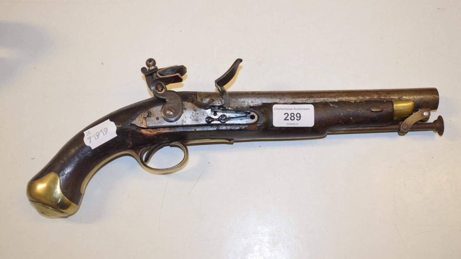 A late 18th/early 19th century flintlock pistol, some parts replaced, 37 cm long