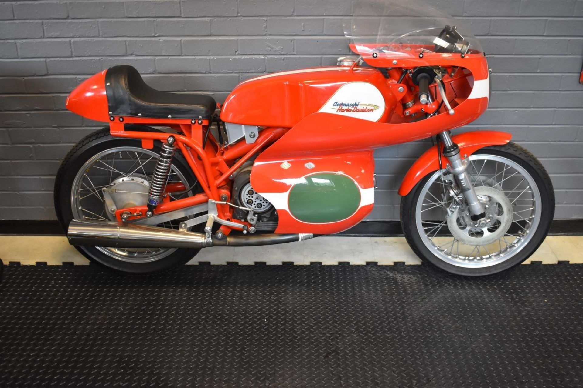 A 1963 Aermacchi Harley-Davidson 250cc, unregistered, red and white. This fully restored and