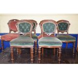 A set of six Victorian mahogany dining chairs, on turned and fluted front legs