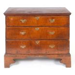 Benjamin Crook: A chest of three drawers, with a (later) mahogany top, walnut veneered drawer