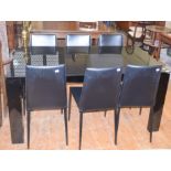 A Calligaris black glass topped extending dining table, 160 cm wide, and six matching chairs (7)