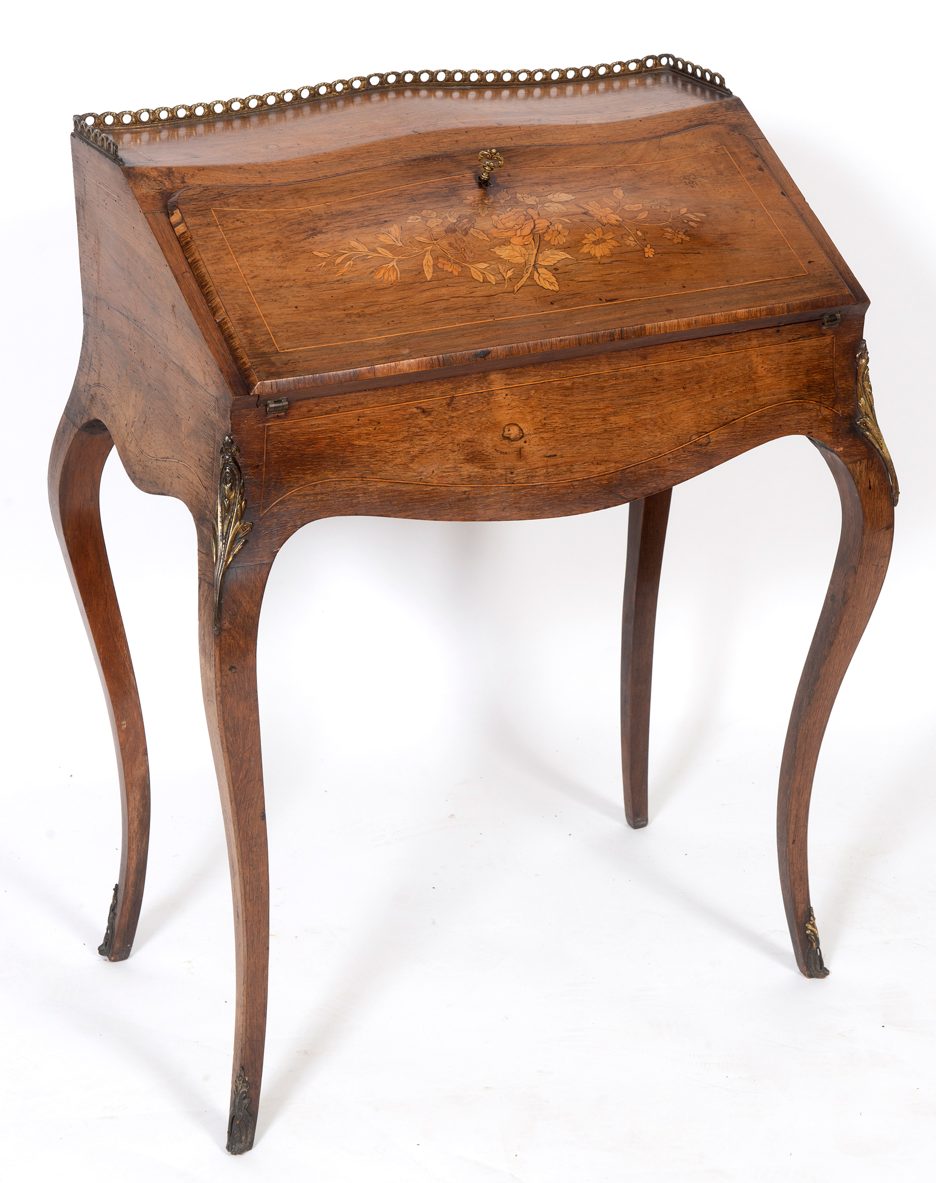 A French rosewood bonheur du jour, with a brass three quarter gallery and fall front with floral