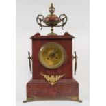 A late 19th century mantel clock, the 8.5 cm brass dial with Arabic numerals, fitted an eight day