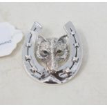 A silver brooch, in the form of a fox within a horseshoe Report by RB Modern