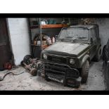 A 1989 Suzuki SJ 413QB JA Samurai project, registration number F143 KMR, green. This Suzuki jeep has