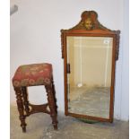 A late Victorian painted satinwood wall mirror, 86 x 43 cm, and a Victorian mahogany stool, on