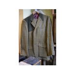 A Tailoring-By-Gently two piece tweed shooting suit, comprising a jacket and plus fours, new and