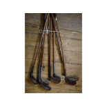 Five golfing irons, with hickory shafts, and three similar woods (8) Report Names on woods: R Forgan